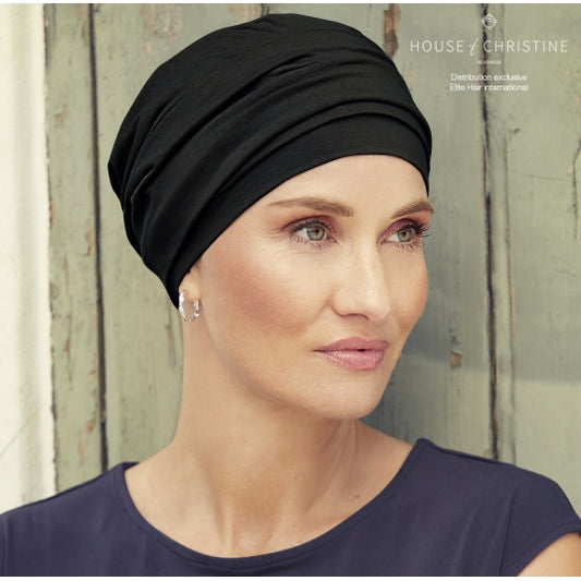 Turban en coton de luxe, doux et élégant, idéal pour pelade ou perte de cheveux après chimio, avec maintien et style garantis.