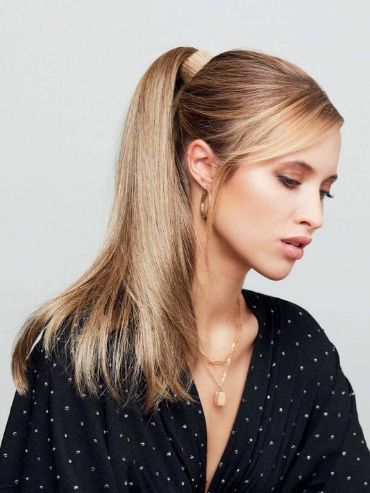 Tango A Hair To Go Gisela Mayer : queue de cheval à clipser, attache camouflable, look naturel, entretien avec shampooing et baume adaptés.