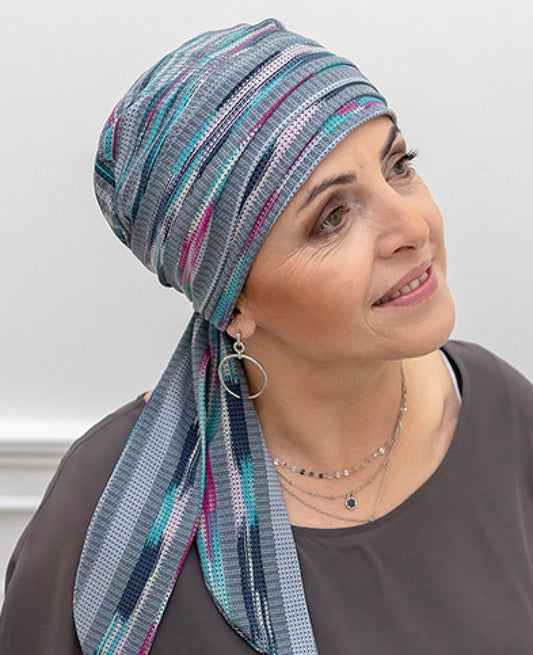 Turban chimio Teresa gris à pan long, élégant et confortable, idéal pour alopécie ou chimiothérapie au quotidien.