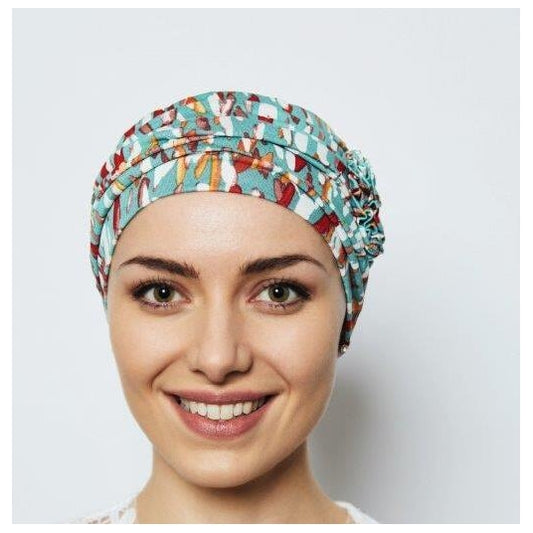 Coup de cœur Rose comme Femme, ce bonnet doux et soyeux protège le cuir chevelu sensible après chimio ou pelade.