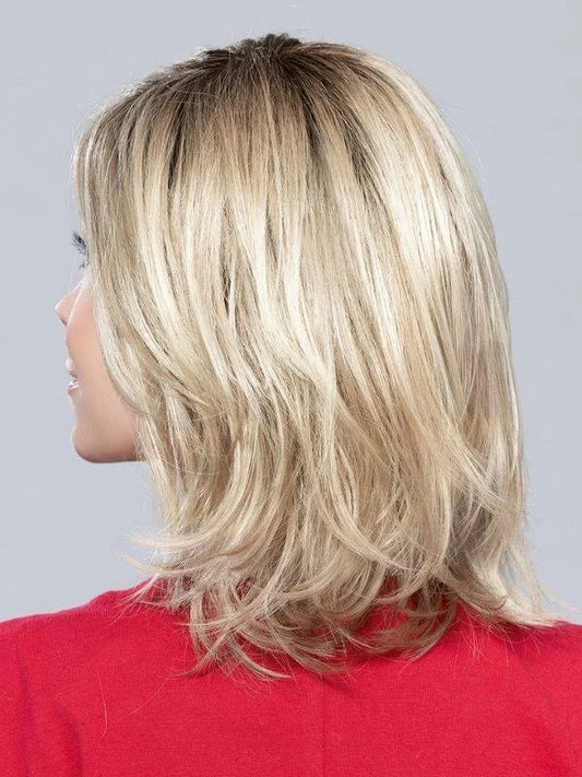 Modern layered bob wig Lucky Mono Part by Ellen Wille with side-swept fringe.
