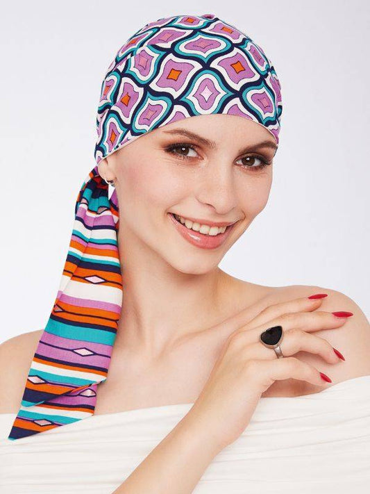 Turban chimio femme Lory, doux et respirant, offre confort et style modulable pour alopécie au quotidien.
