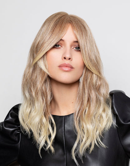 Volumateur Top Curly Long de Gisela Mayer, long ondulé avec frange rideau, mono-filament et clips pour volume naturel.